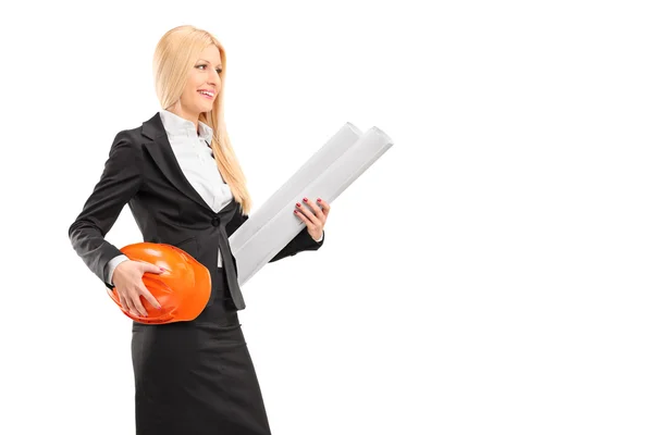 Female architect holding helmet — Stock Photo, Image
