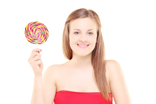 Young girl holding lollipop — Stock Photo, Image