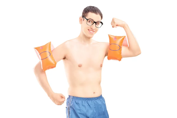 Man with swimming arm bands — Stock Photo, Image
