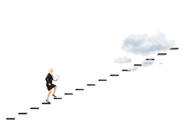 Businesswoman walking towards the heights — Stock Photo, Image