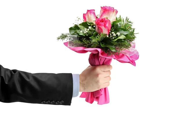 Hand hält einen Strauß Rosen — Stockfoto