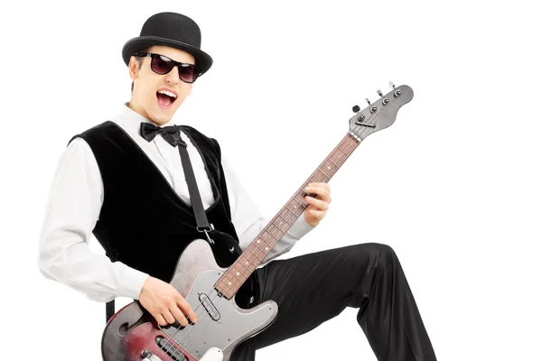 Euphoric man playing bass guitar — Stock Photo, Image