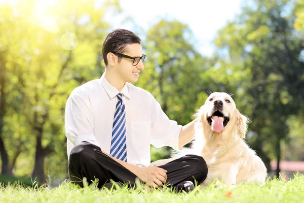 Young businessman with his dog — Stock Photo, Image