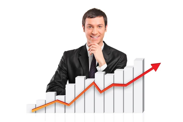Businessman behind financial graph — Stock Photo, Image