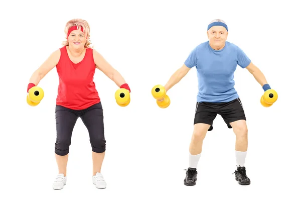 Hombre y mujer haciendo ejercicio con pesas —  Fotos de Stock