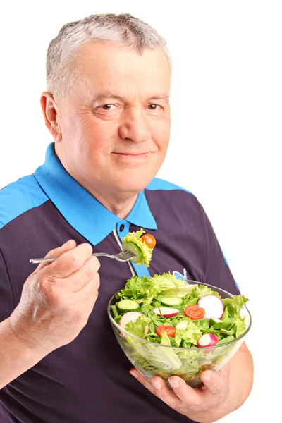 Uomo maturo mangiare insalata — Foto Stock