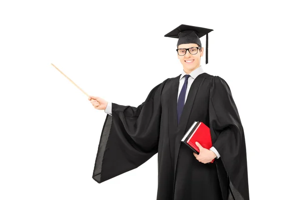 Masculino faculdade graduado segurando livros — Fotografia de Stock