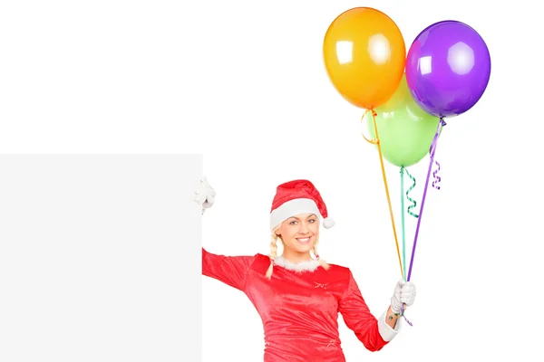 Female holding balloons — Stock Photo, Image