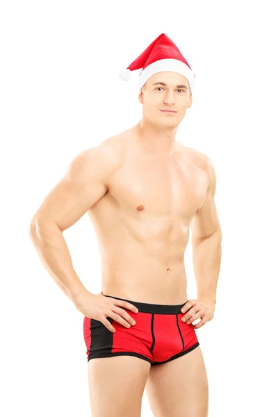 Homme avec chapeau de Père Noël portant des sous-vêtements — Photo