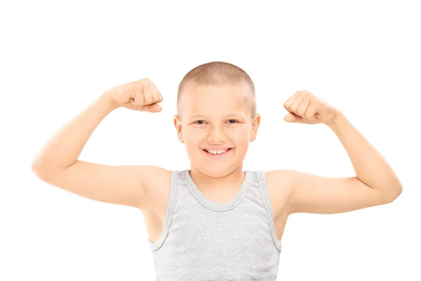 Little boy showing muscles — Stock Photo, Image