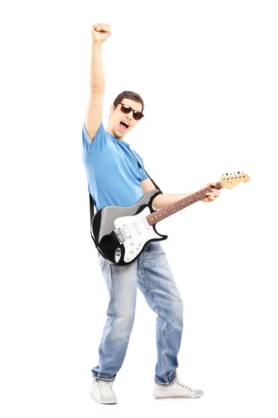 Happy guy playing on guitar — Stock Photo, Image