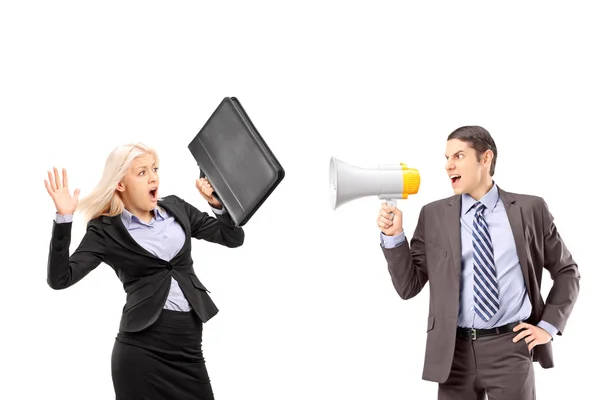 Businesswoman and manager shouting with speakerphone — Stock Photo, Image