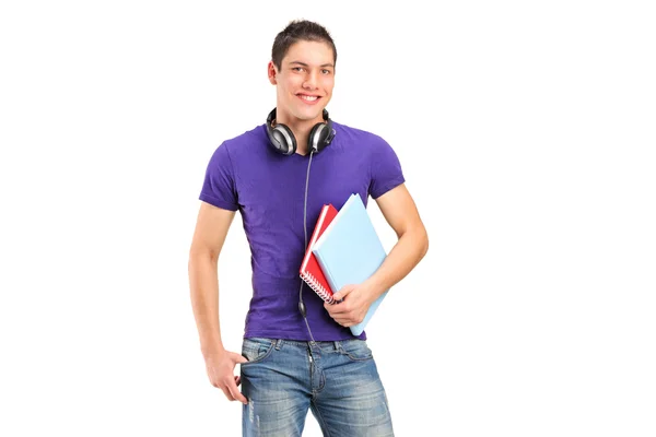 Ragazzo della scuola tenendo libri — Foto Stock