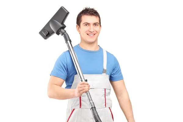 Male worker holding vacuum cleaner — Stock Photo, Image