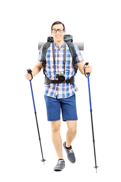Hiker with hiking poles walking — Stock Photo, Image