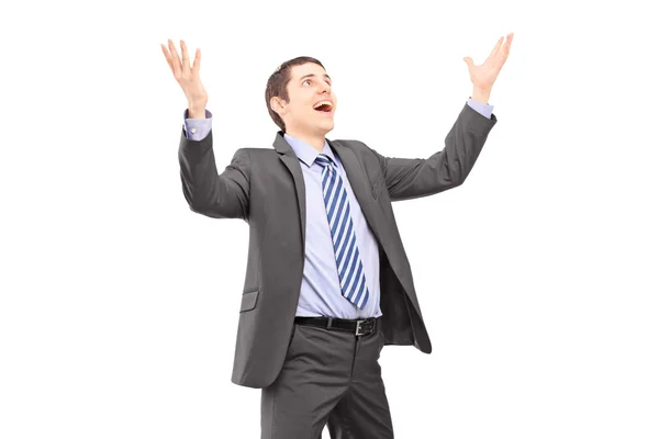 Businessman with raised hands Stock Photo