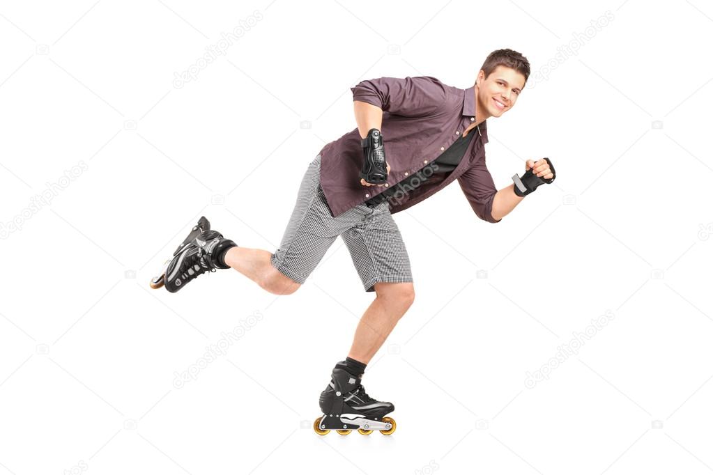 Handsome man roller skating