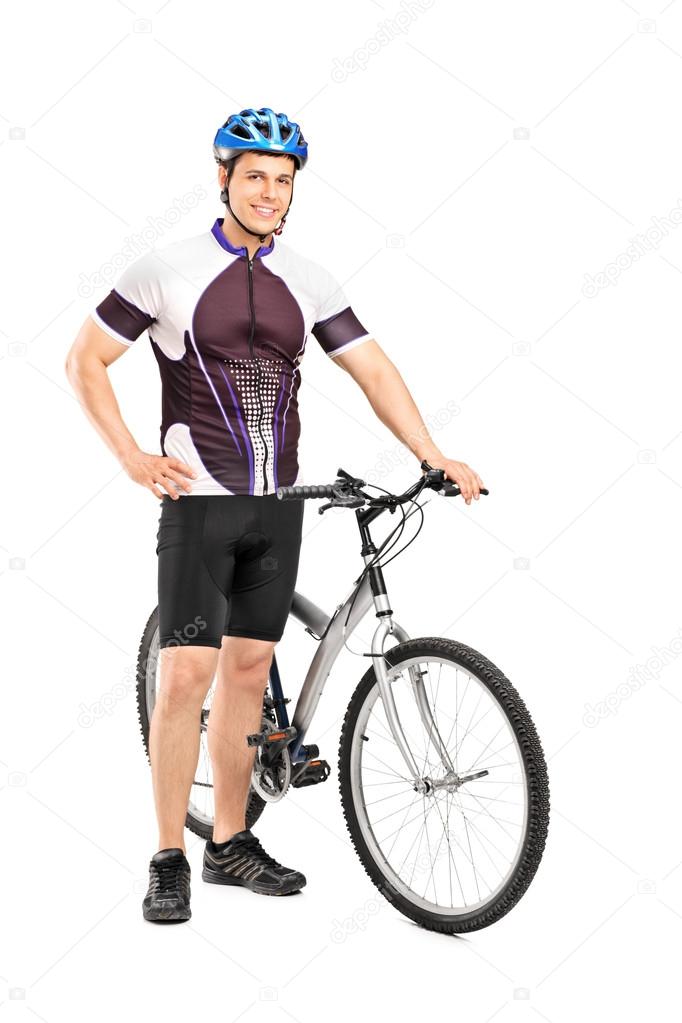 Bicyclist next to bicycle