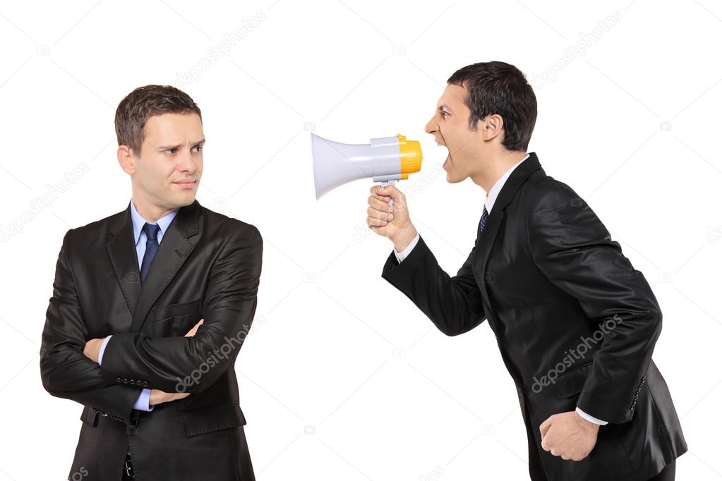 Businessman yelling via megaphone