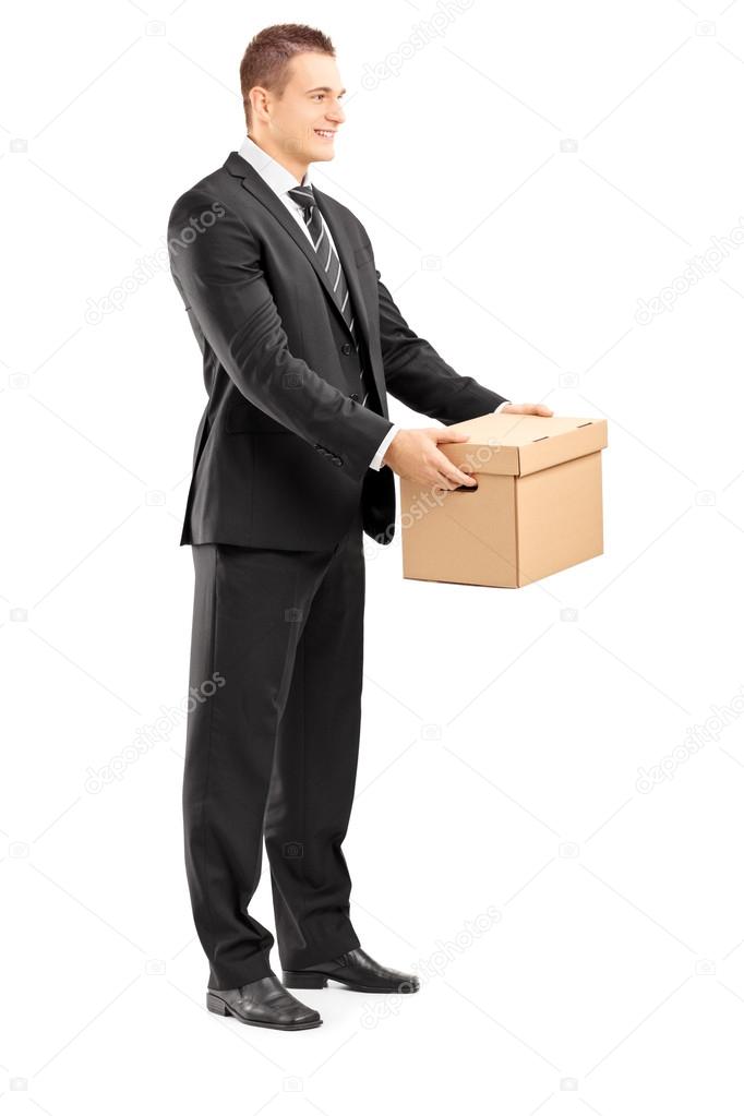 Businessman giving box to someone