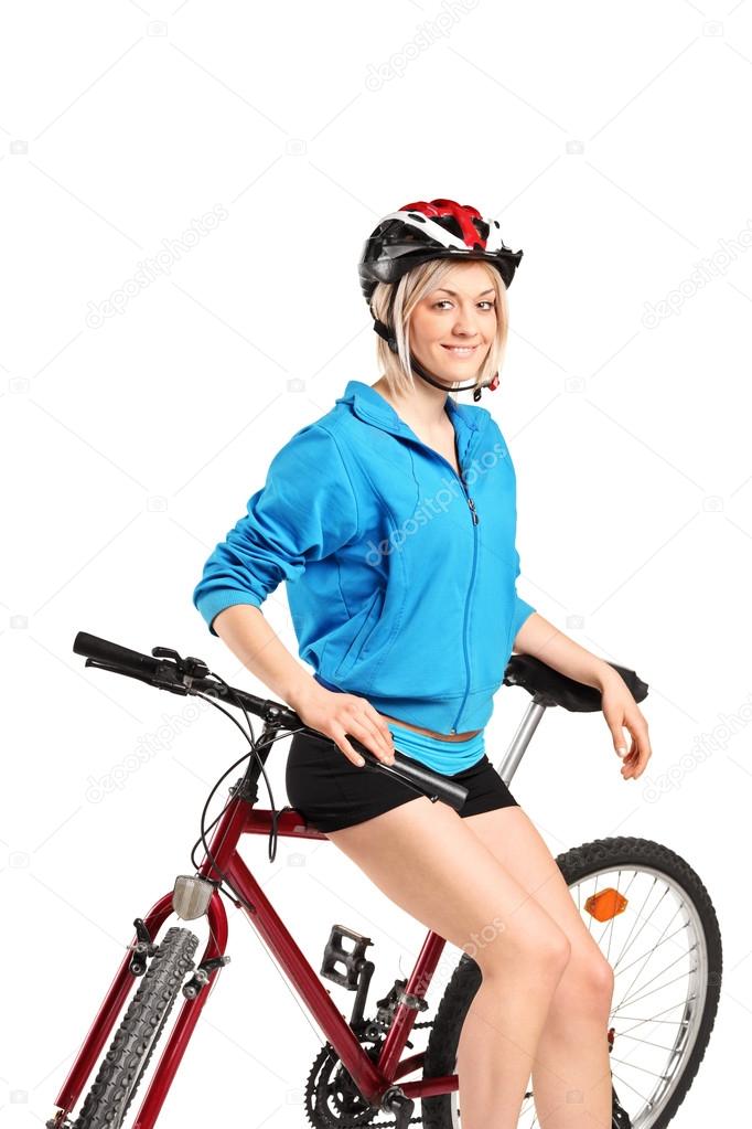 Girl posing on bike