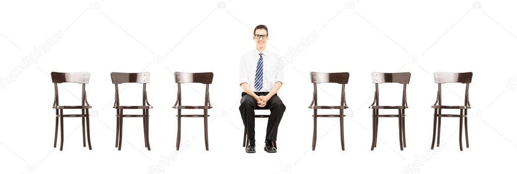 Male on chair waiting for job interview