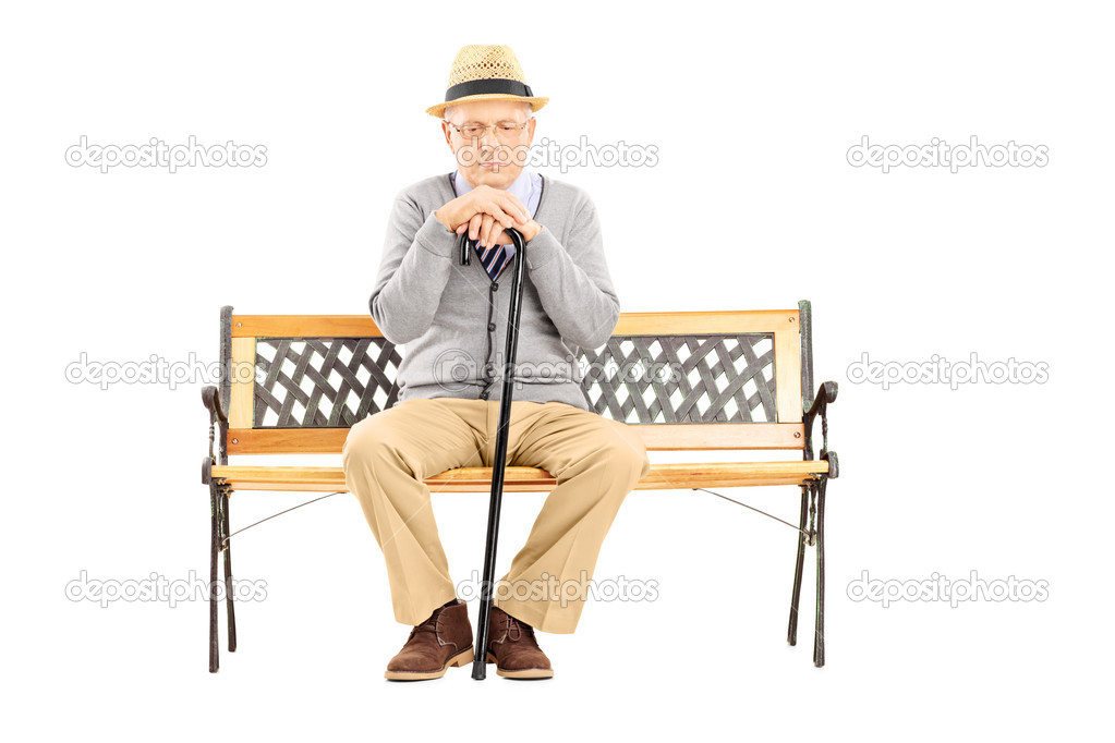 Senior man with cane on bench