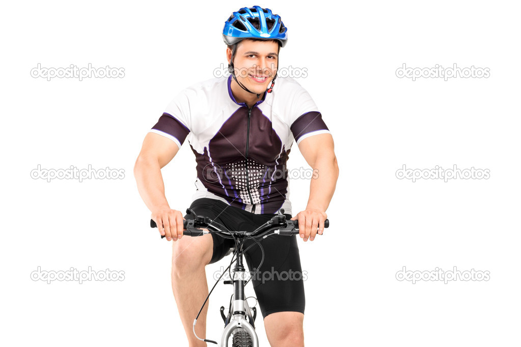 Male bicyclist posing on bicycle