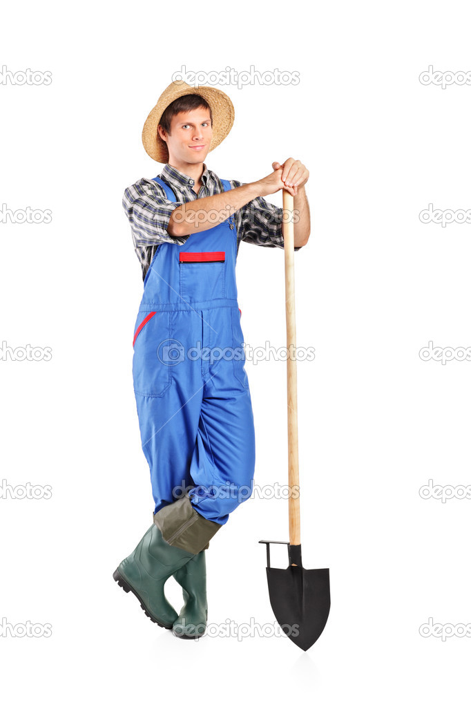 Male worker holding shovel