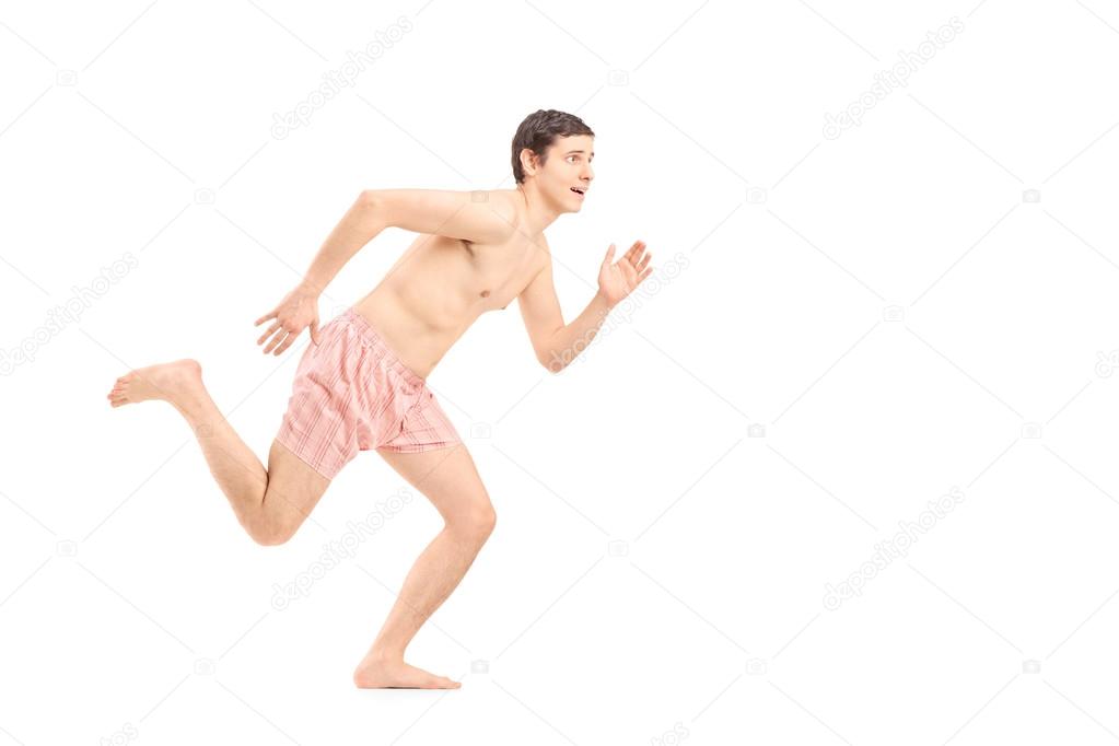 Naked man running away
