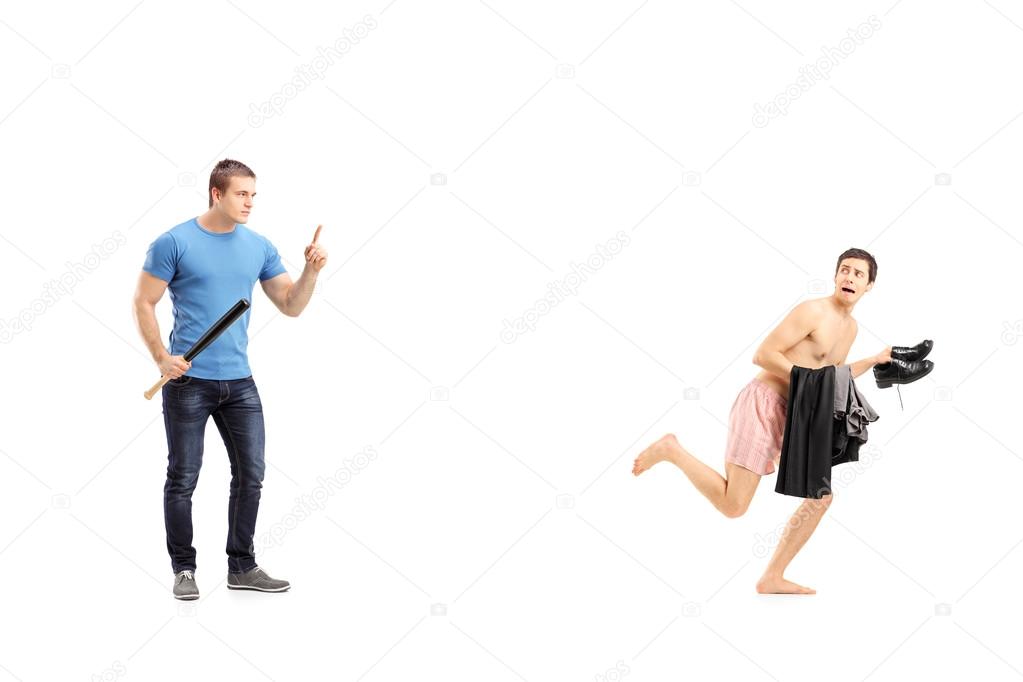 Man holding bat and naked man in underwear