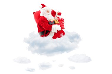 Noel Baba bulutların üstünde oturmuş