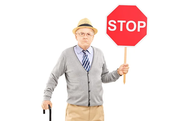 Gentleman holding stop sign — Stock Photo, Image