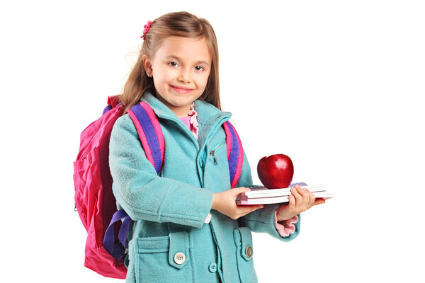 School girl holding apple