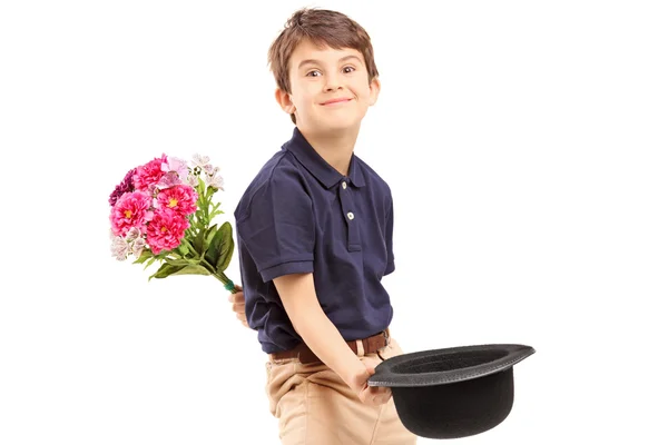 Kid segurando um monte de flores — Fotografia de Stock