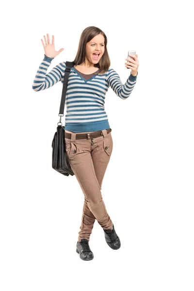 Girl looking at cell phone — Stock Photo, Image