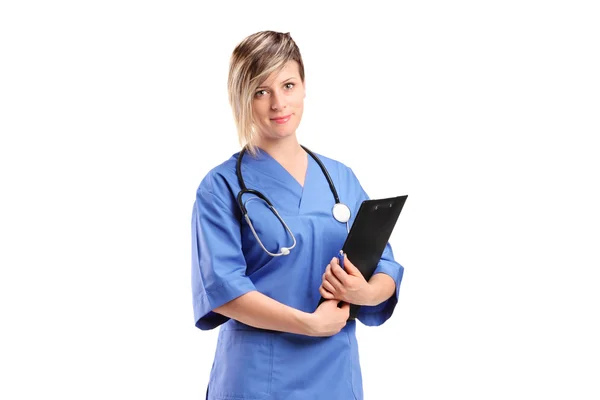 Healthcare professional holding clipboard — Stock Photo, Image