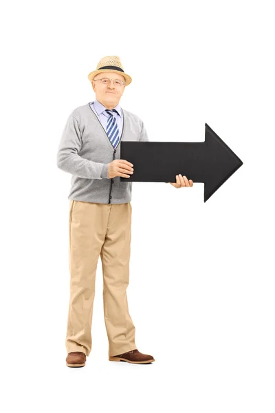 Senior gentleman holding arrow — Stock Photo, Image
