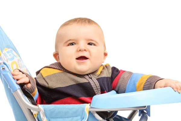 Boy sitting in baby stroller — Stock Photo, Image