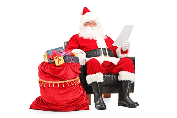 Santa Claus reading letter — Stock Photo, Image