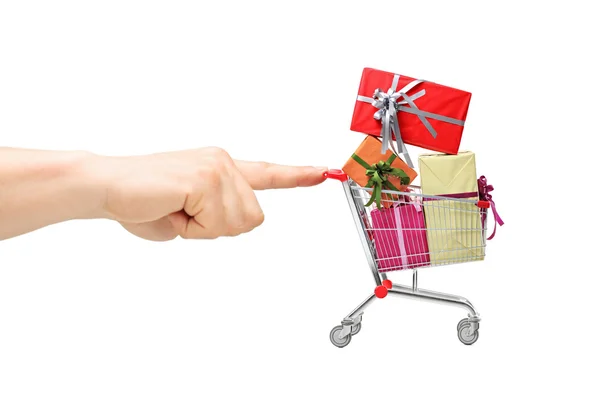 Finger pushing shopping cart — Stock Photo, Image