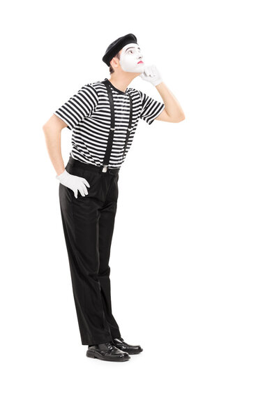 Mime artist listening something 