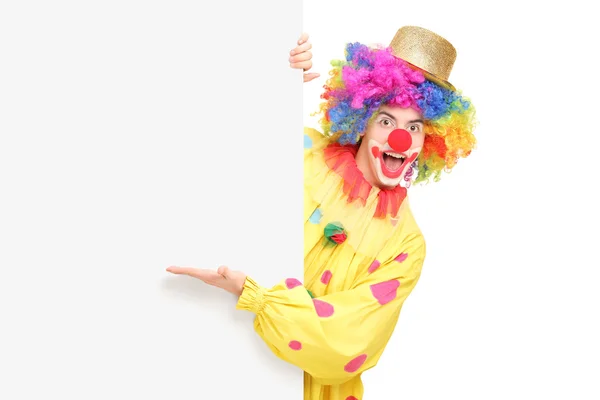 Cirkus clown bakom panel — Stockfoto