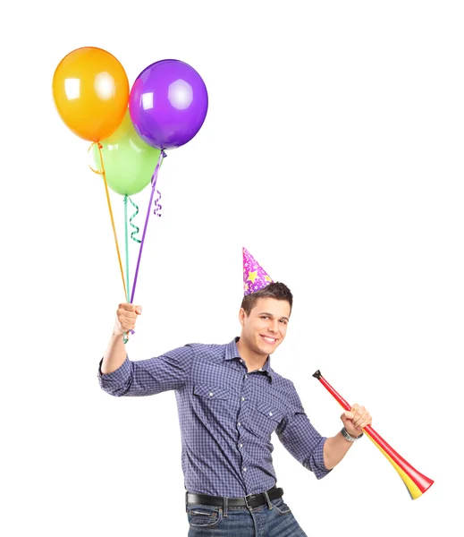 Feliz masculino segurando balões — Fotografia de Stock