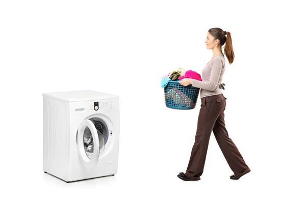 Female holding laundry basket — Stock Photo, Image