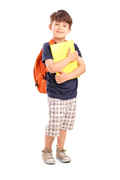 Escola menino segurando notebook — Fotografia de Stock