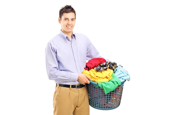 Adam tutarak çamaşır sepeti — Stok fotoğraf