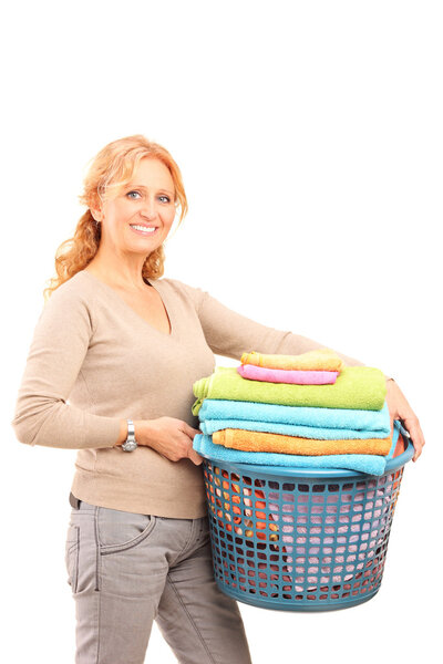 Lady holding laundry basket