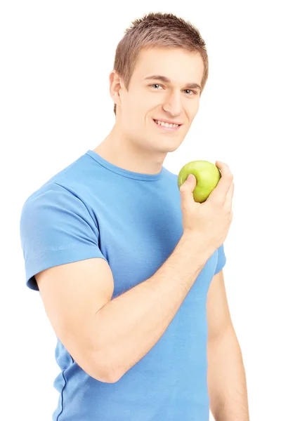 Jonge met groene apple — Stockfoto