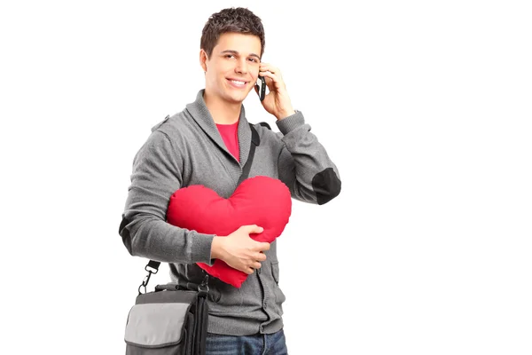 Student holding red heart — Stock Photo, Image